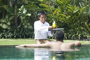 Butler serving drink in Bali.jpg